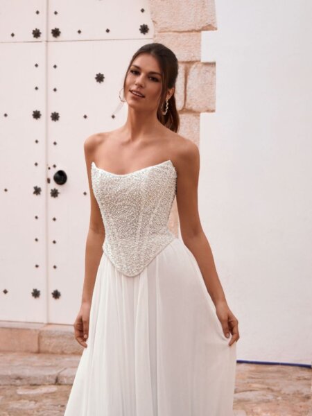 Enzoani Love Fenora B A line chiffon skirt with separate beaded corset lightweight and perfect for a wedding abroad front view.