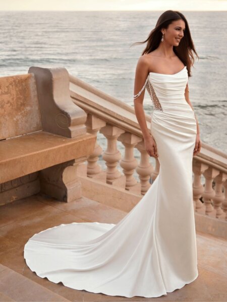 Enzoani love Fosetta wedding dress with plain rouched bodice and stunning beaded illusion back front view.