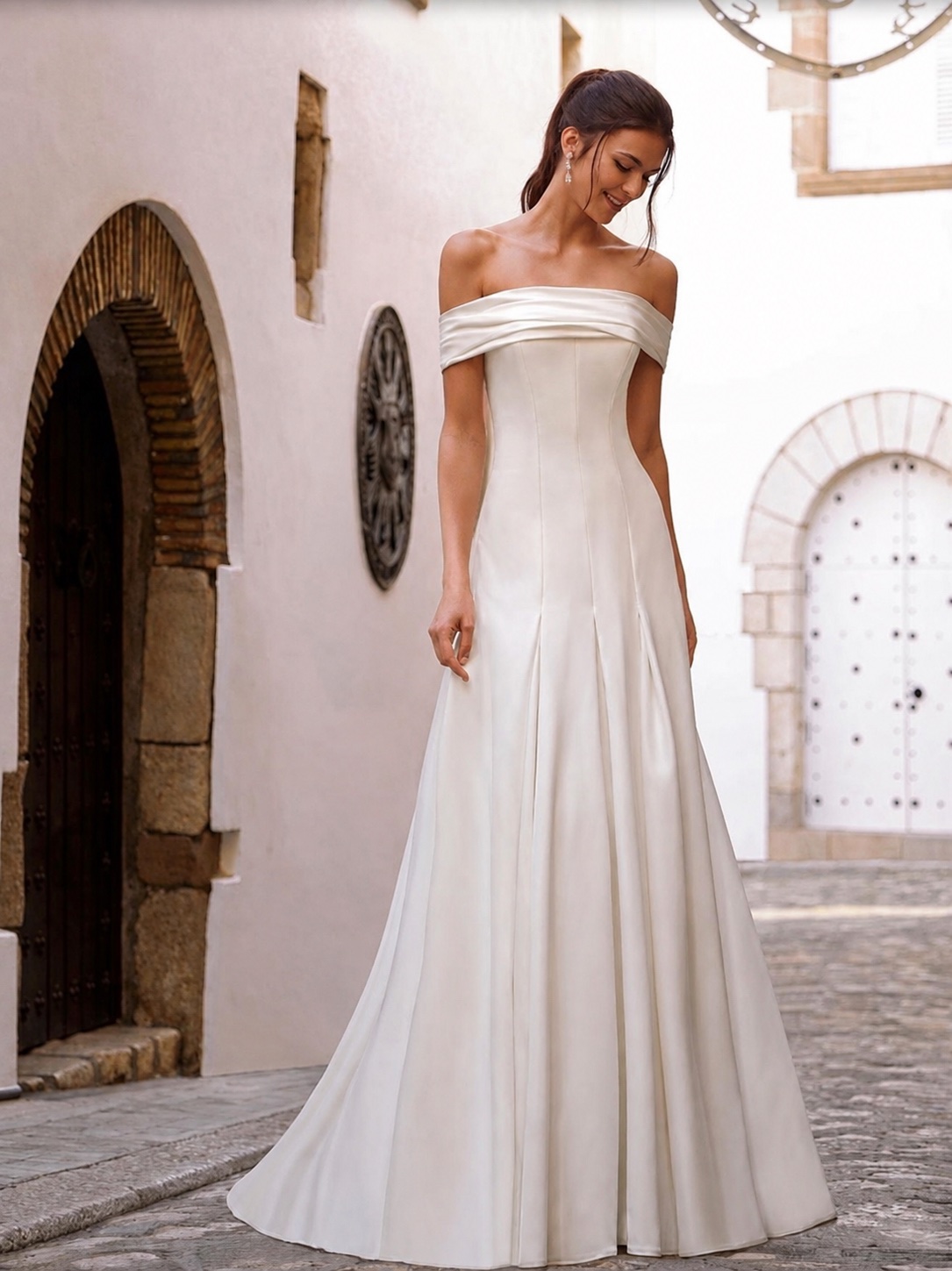 A line dress fitted to low hip with optional Bardot cuff front view.