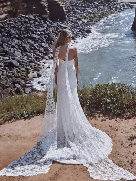 Calla Blanche Allegra fitted lace wedding dress with pearl detail and optional choker with train back view.