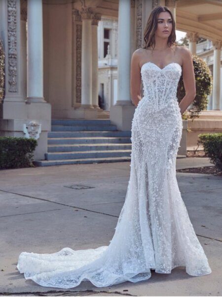 Calla Blanche Renata lace wedding dress with fitted silhouette with translucent side panel front view.