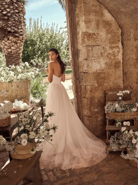 Modeca Marleah plain wedding dress with satin bodice and soft A-line skirt back view.
